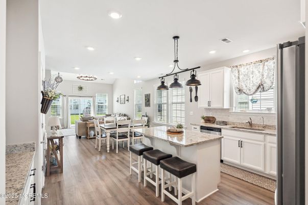 Chandelier, Dining room, Interior, Kitchen, Living room, Pendant Lights, Recessed Lighting, Wood Texture Flooring