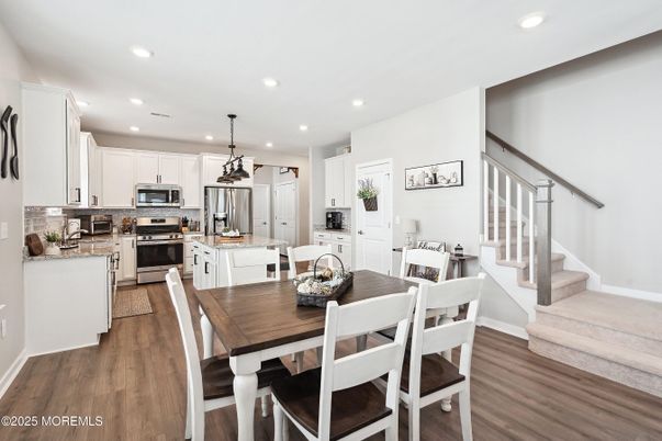 Dining room, Interior, Kitchen, Pendant Lights, Recessed Lighting, Stainless Steel Appliances, Wood Texture Flooring