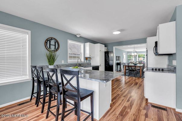 Chandelier, Dining room, Interior, Kitchen, Pendant Lights, Recessed Lighting, Wood Texture Flooring