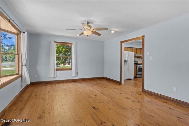Empty room, Interior, Kitchen, Stainless Steel Appliances, Wood Texture Flooring