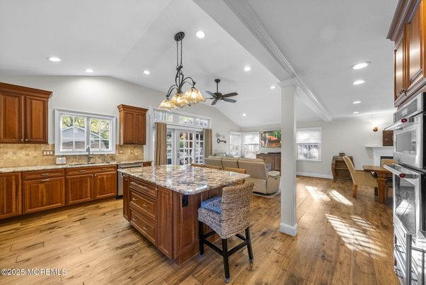 Chandelier, Dining room, Interior, Kitchen, Living room, Pendant Lights, Recessed Lighting, Wood Texture Flooring