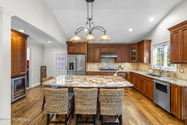 Chandelier, Interior, Kitchen, Recessed Lighting, Stainless Steel Appliances, Wood Texture Flooring