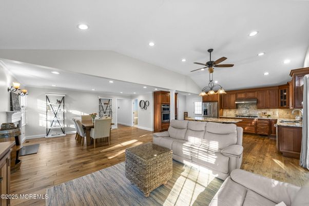 Dining room, Interior, Kitchen, Living room, Recessed Lighting, Stainless Steel Appliances, Wood Texture Flooring
