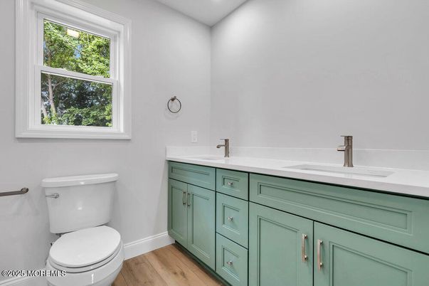 Bathroom, Dual Sink Vanities, Interior, Recessed Lighting, Wood Texture Flooring