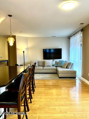Dining room, Interior, Living room, Pendant Lights, Recessed Lighting, Wood Texture Flooring