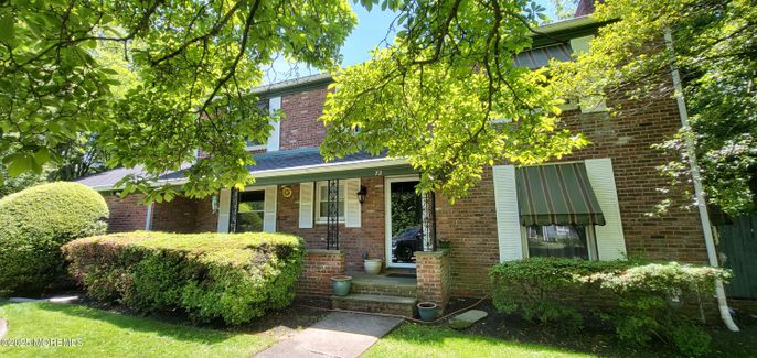 Exterior, Facade, Brick Facade, American Foursquare