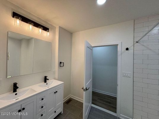 Bathroom, Dual Sink Vanities, Interior, Recessed Lighting, Wood Texture Flooring