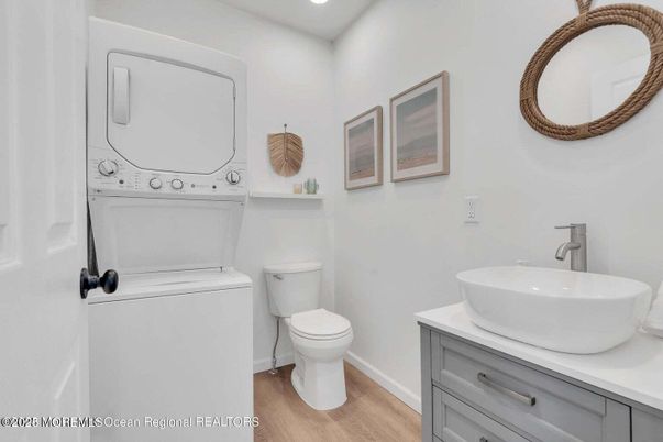 Bathroom, Interior, Recessed Lighting, Utility Closets, Washer, Wood Texture Flooring