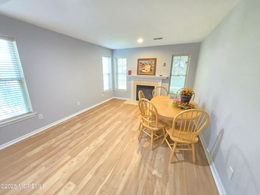 Dining room, Fireplace, Interior, Recessed Lighting, Wood Texture Flooring