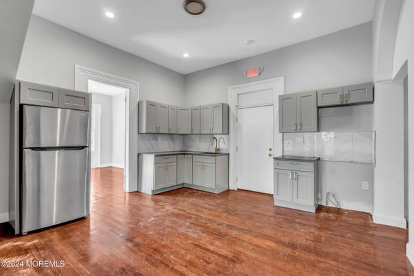 Interior, Kitchen, Marble Walls, Recessed Lighting, Wood Texture Flooring