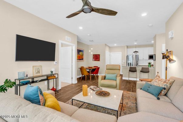 Dining room, Interior, Kitchen, Living room, Recessed Lighting, Stainless Steel Appliances, Wood Texture Flooring