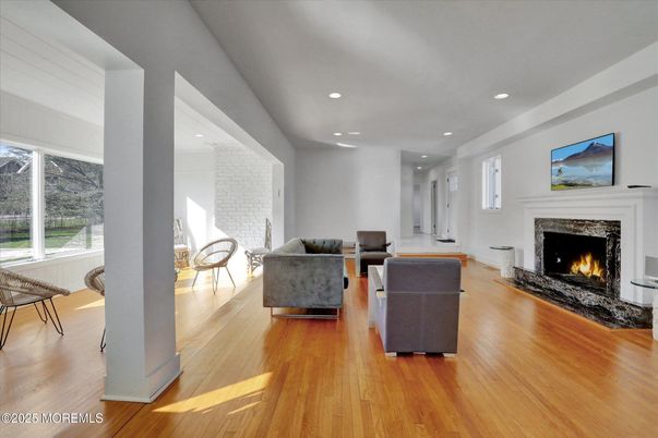 Fireplace, Interior, Living room, Recessed Lighting, Wood Texture Flooring