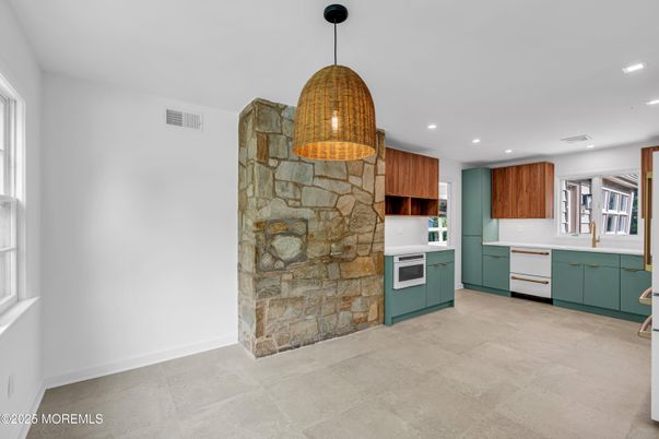 Fireplace, Interior, Kitchen, Pendant Lights, Recessed Lighting, Stone Walls