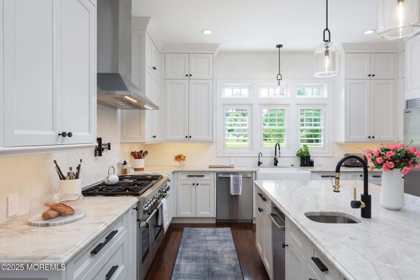 Interior, Kitchen, Pendant Lights, Recessed Lighting, Stainless Steel Appliances, Tile Countertops, Wood Texture Flooring