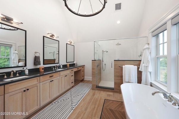 Bathroom, Dual Sink Vanities, Free Standing Baths, Glass Shower, Interior, Recessed Lighting, Wood Texture Flooring