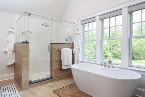 Bathroom, Free Standing Baths, Glass Shower, Interior, Recessed Lighting, Wood Texture Flooring