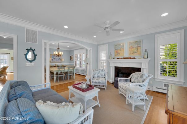Chandelier, Dining room, Fireplace, Interior, Living room, Recessed Lighting, Wood Texture Flooring