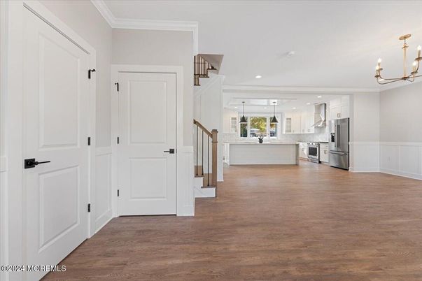 Chandelier, Interior, Kitchen, Recessed Lighting, Stainless Steel Appliances, Wood Texture Flooring