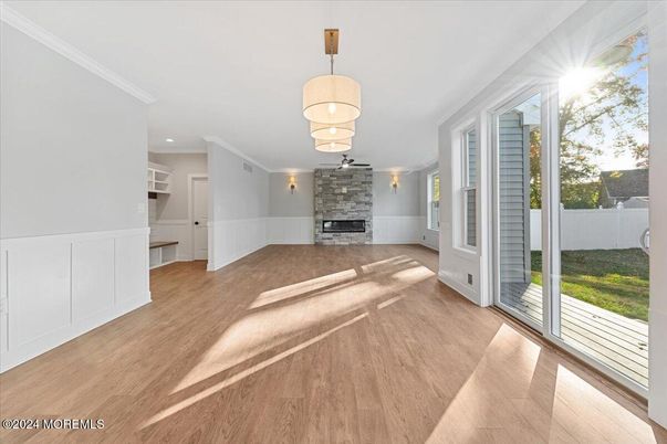 Empty room, Fireplace, Interior, Pendant Lights, Recessed Lighting, Wood Texture Flooring