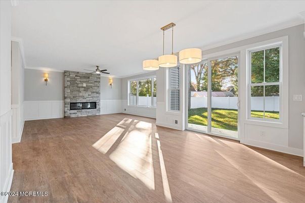 Empty room, Fireplace, Interior, Pendant Lights, Wood Texture Flooring