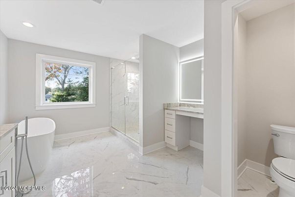 Bathroom, Free Standing Baths, Glass Shower, Interior, Marble, Marble Walls, Recessed Lighting