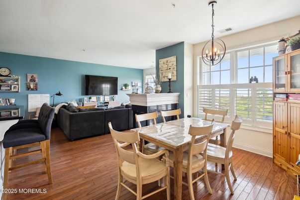 Chandelier, Dining room, Fireplace, Interior, Living room, Piano, Wood Texture Flooring