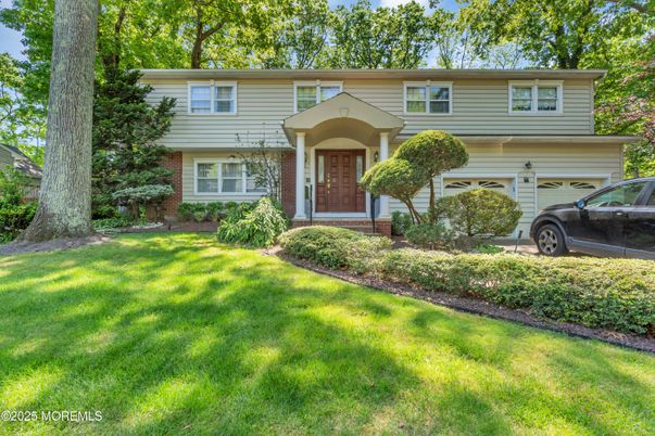 Attached, Exterior, Facade, Brick Facade, Raised Ranch