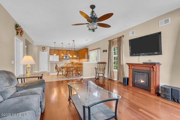 Dining room, Fireplace, Interior, Kitchen, Pendant Lights, Wood Texture Flooring