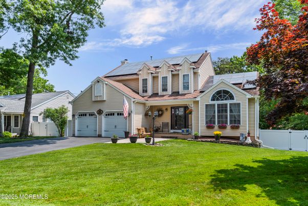 Attached, Exterior, Facade, Solar Panels, Queen Anne Victorian