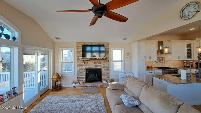 Fireplace, Interior, Kitchen, Living room, Pendant Lights, Stone Walls, Wood Texture Flooring