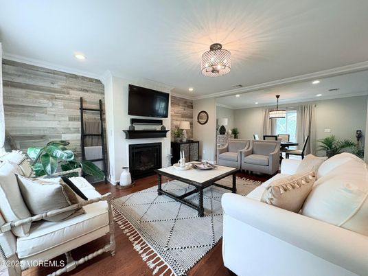 Dining room, Fireplace, Interior, Living room, Pendant Lights, Recessed Lighting, Wood Texture Flooring, Wooden Walls