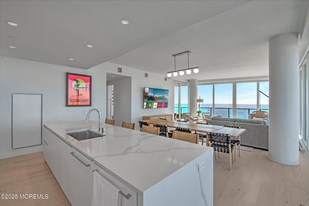 Dining room, Interior, Kitchen, Pendant Lights, Recessed Lighting, Water, Wood Texture Flooring