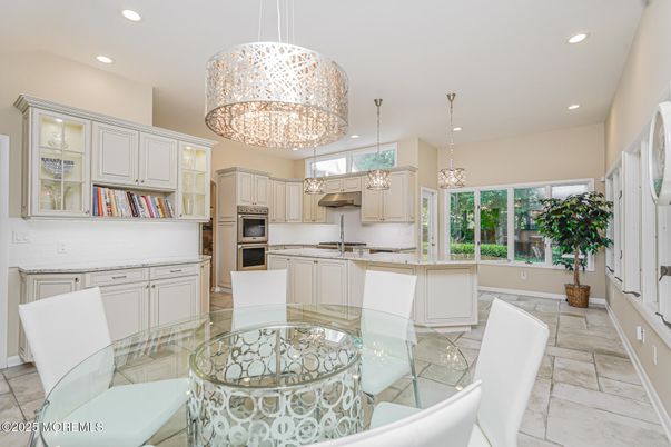 Chandelier, Dining room, Interior, Kitchen, Pendant Lights, Recessed Lighting, Stainless Steel Appliances