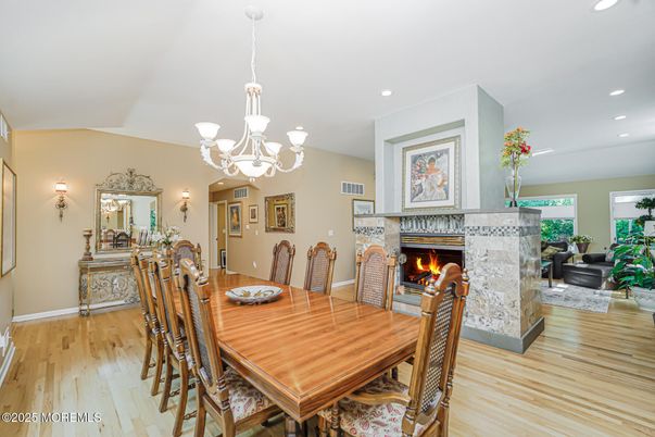 Chandelier, Dining room, Fireplace, Interior, Recessed Lighting, Wood Texture Flooring