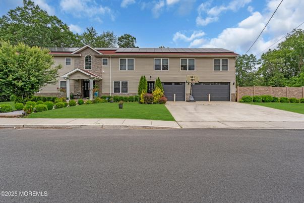 Attached, Exterior, Facade, Solar Panels, Raised Ranch
