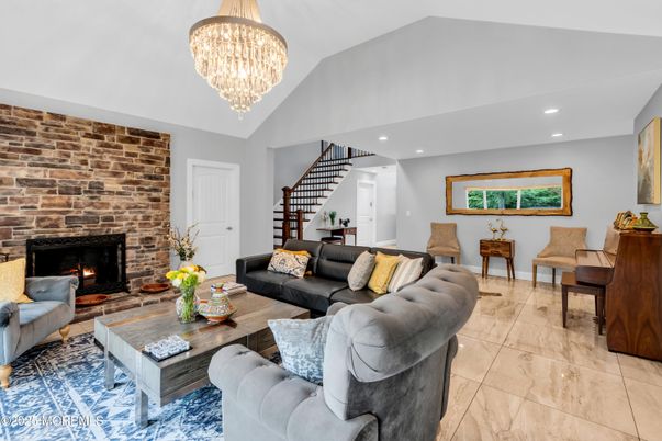 Chandelier, Fireplace, Interior, Living room, Recessed Lighting, Stone Walls
