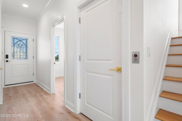 Elevator, Interior, Recessed Lighting, Wood Texture Flooring