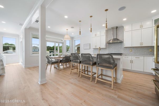 Dining room, Interior, Kitchen, Pendant Lights, Recessed Lighting, Stainless Steel Appliances, Wood Texture Flooring