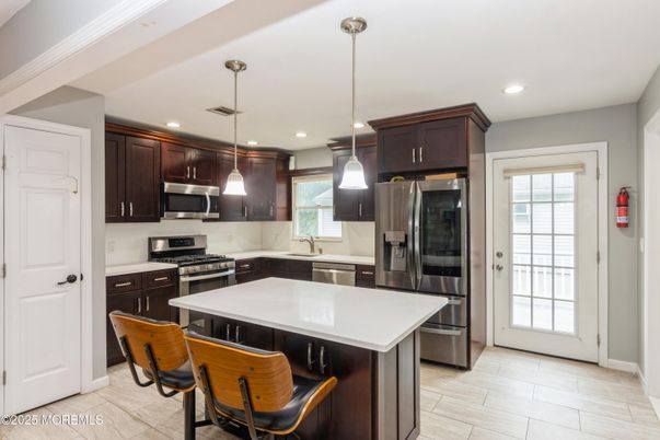 Interior, Kitchen, Pendant Lights, Recessed Lighting, Stainless Steel Appliances, Wood Texture Flooring