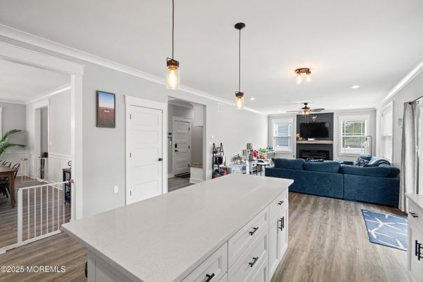Fireplace, Interior, Living room, Pendant Lights, Recessed Lighting, Wood Texture Flooring
