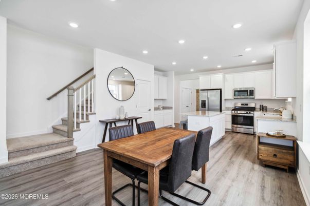 Dining room, Interior, Kitchen, Recessed Lighting, Stainless Steel Appliances, Wood Texture Flooring