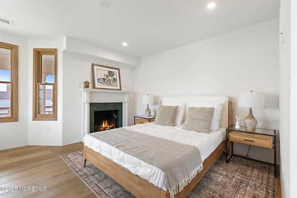 Bedroom, Fireplace, Interior, Recessed Lighting, Wood Texture Flooring