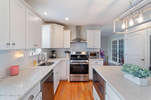 Interior, Kitchen, Pendant Lights, Recessed Lighting, Stainless Steel Appliances, Wood Texture Flooring