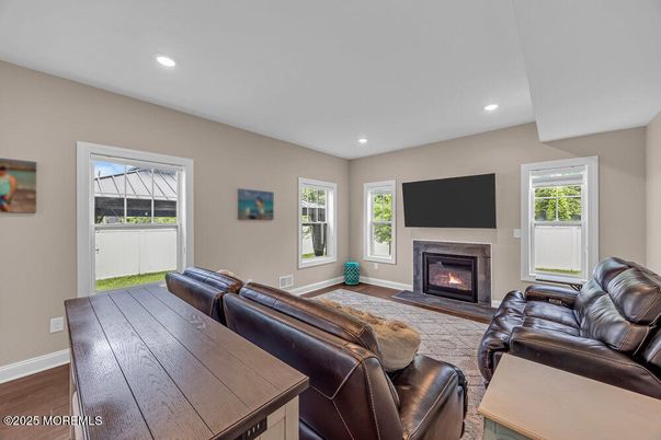Fireplace, Interior, Living room, Recessed Lighting, Wood Texture Flooring