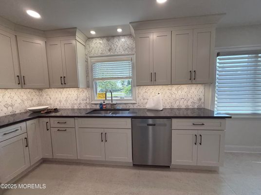 Interior, Kitchen, Marble Walls, Recessed Lighting, Stainless Steel Appliances