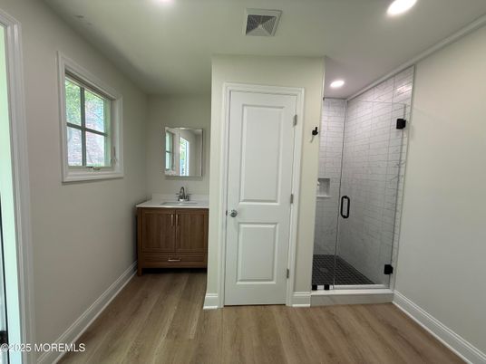 Bathroom, Glass Shower, Interior, Recessed Lighting, Wood Texture Flooring