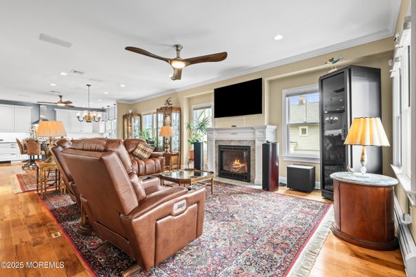 Dining room, Fireplace, Interior, Living room, Pendant Lights, Recessed Lighting, Wood Texture Flooring