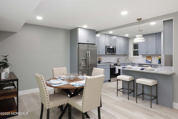 Dining room, Interior, Kitchen, Pendant Lights, Recessed Lighting, Stainless Steel Appliances, Wood Texture Flooring