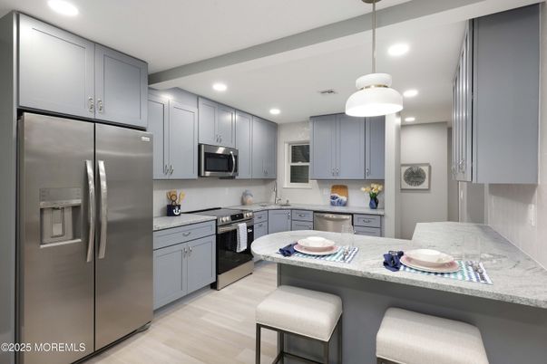 Interior, Kitchen, Pendant Lights, Recessed Lighting, Stainless Steel Appliances, Wood Texture Flooring