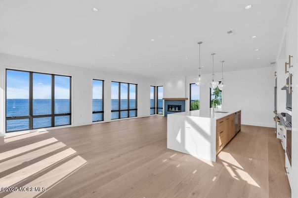 Fireplace, Interior, Kitchen, Pendant Lights, Recessed Lighting, Water, Wood Texture Flooring